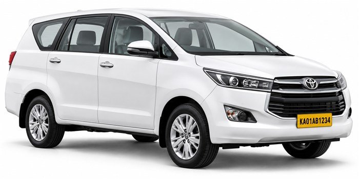 White six-passenger SUV taxi